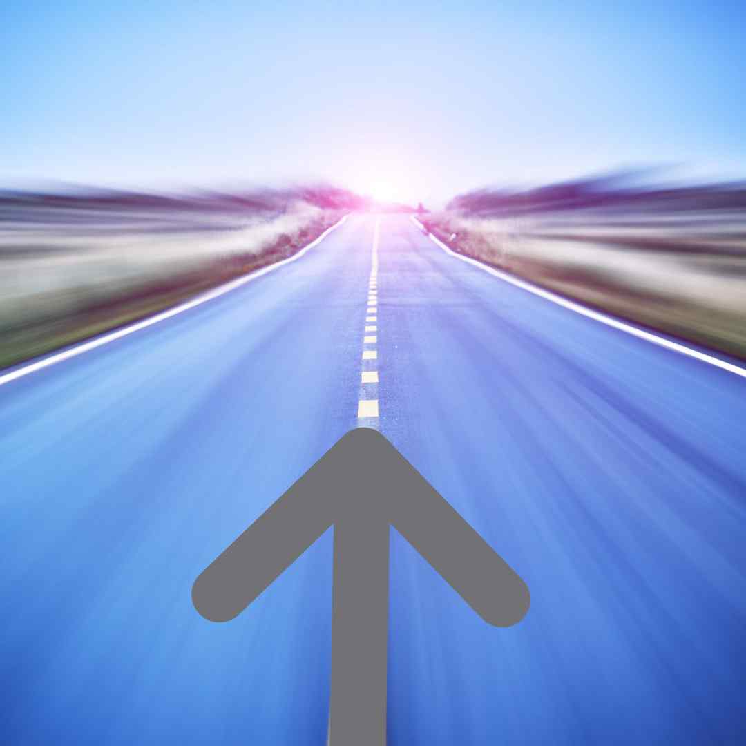 A blue road with an arrow pointing up.